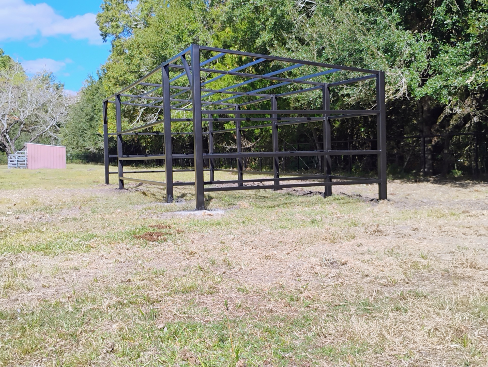 Steel pole barn frame