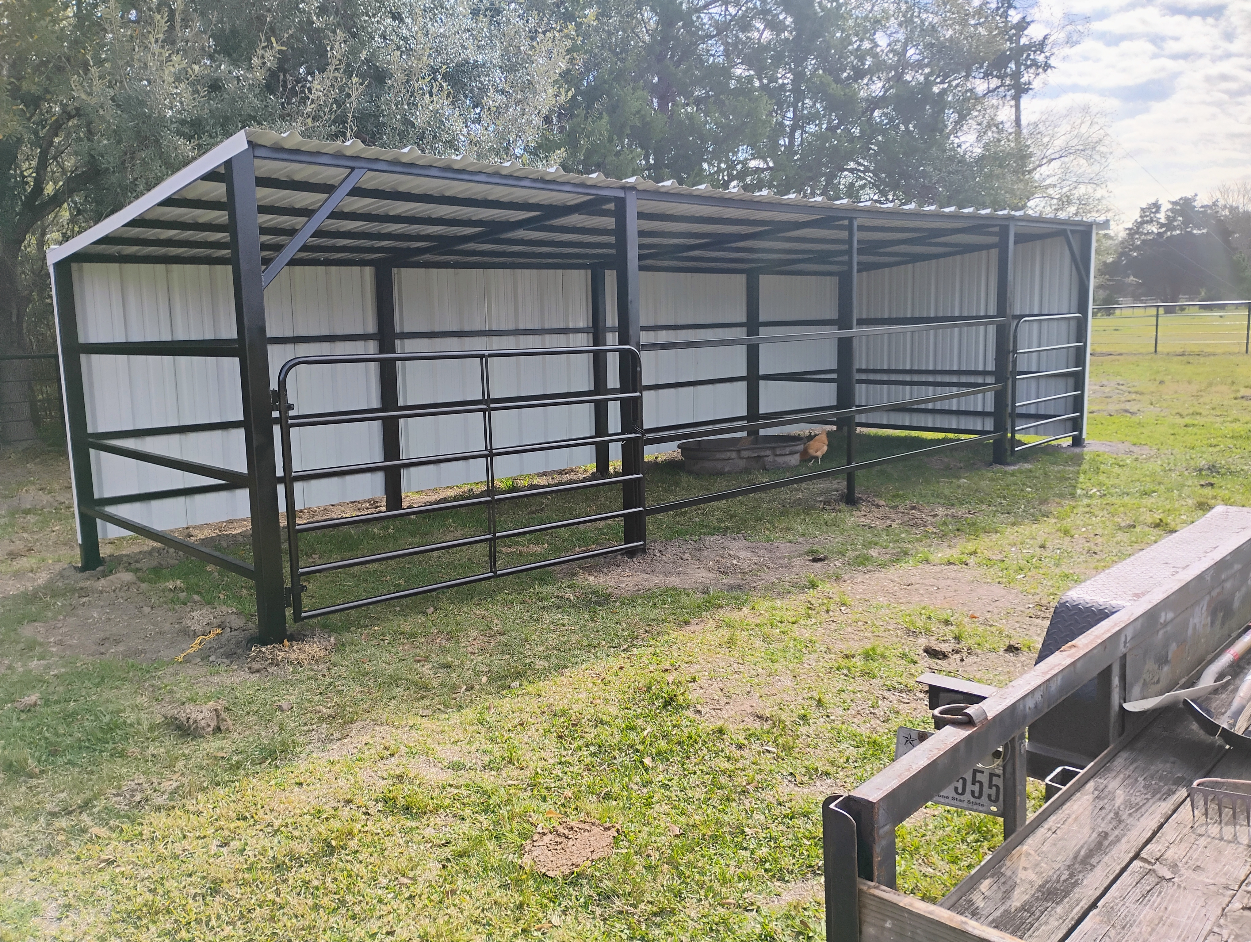 Livestock shelter with gates front view