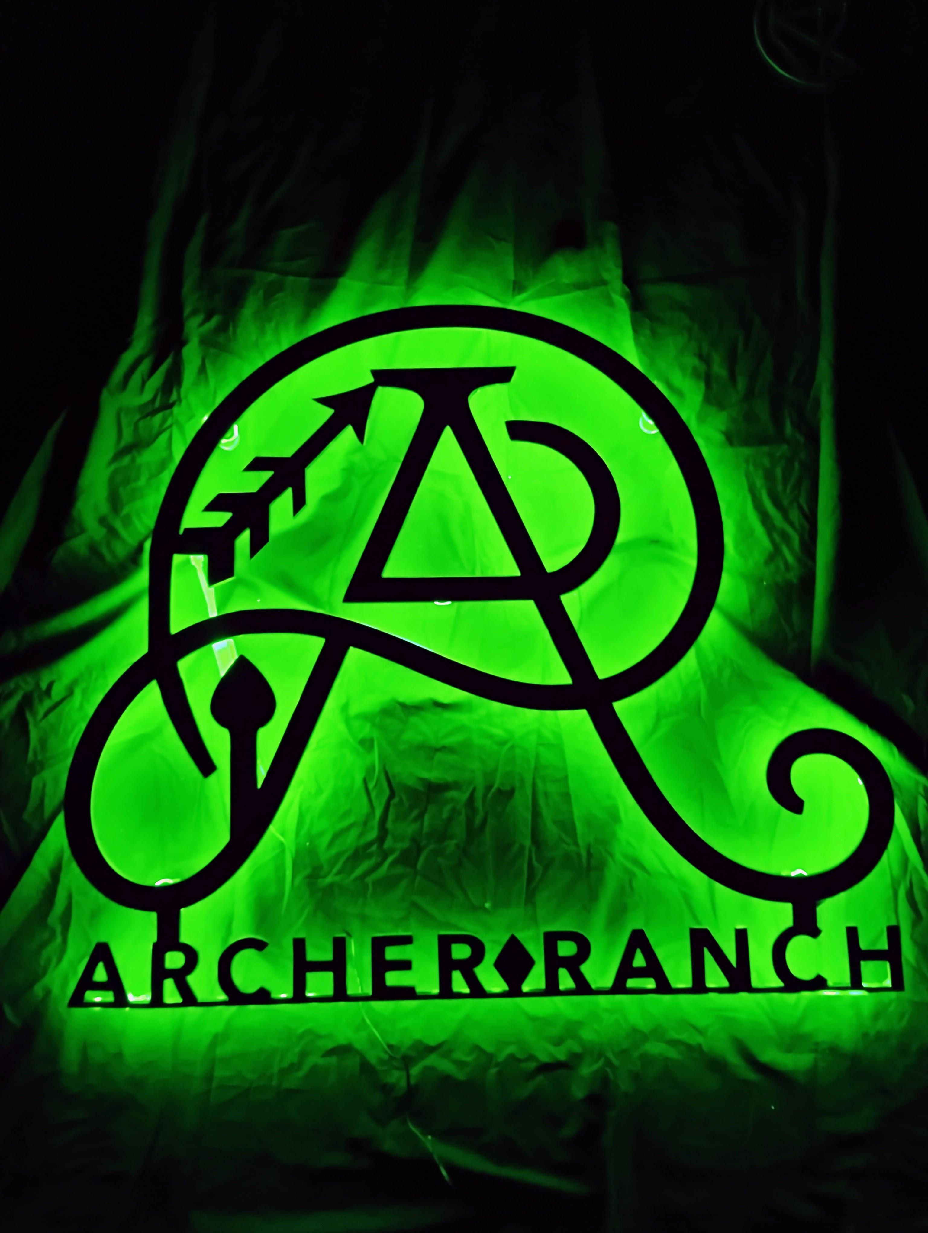 Archer Ranch sign with green LED backlight
