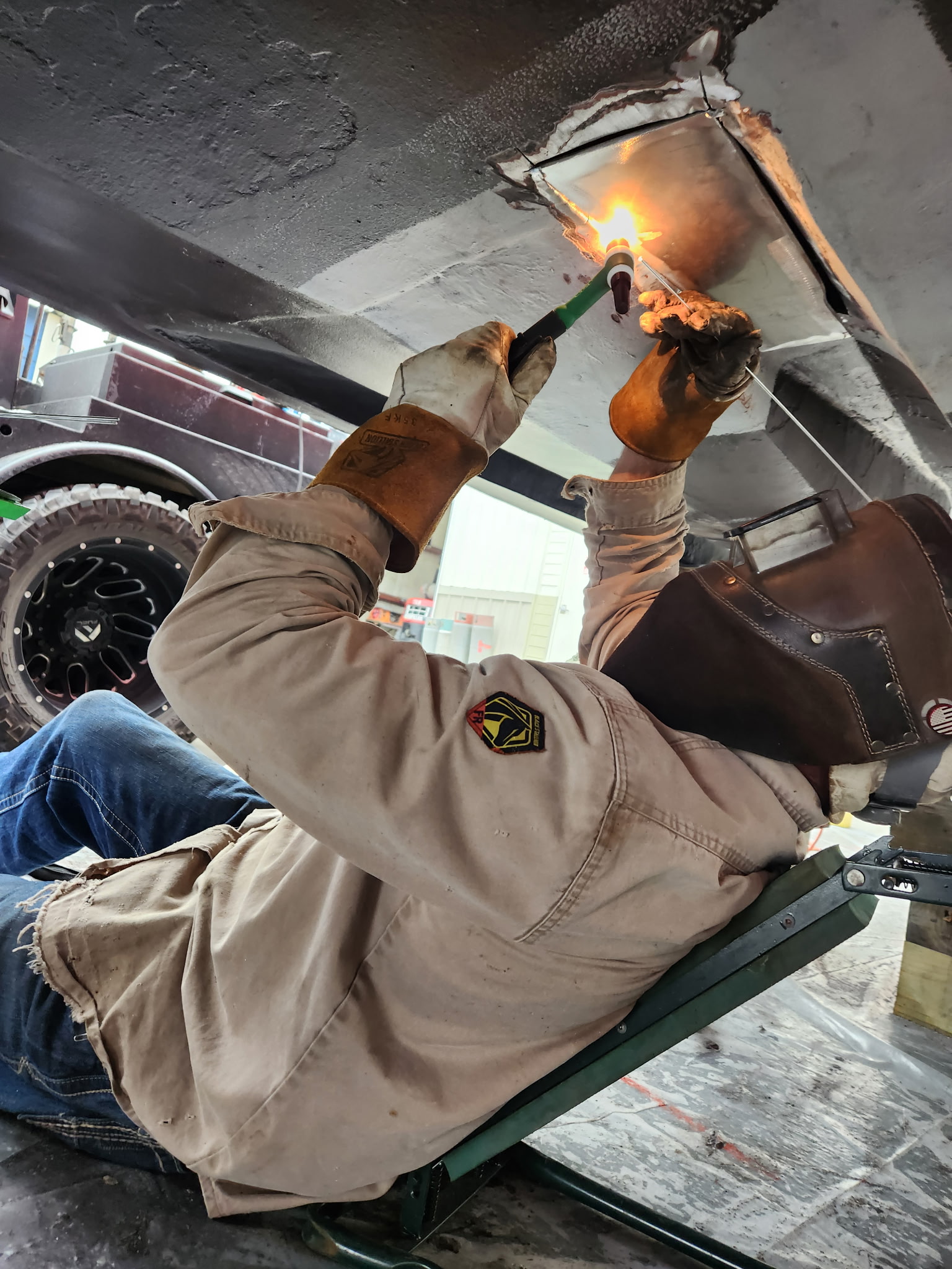 Boat hull repair work area and setup